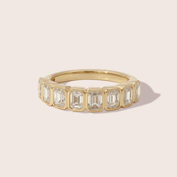 Platinum Emerald Cut Diamond Bezel Half Eternity Ring